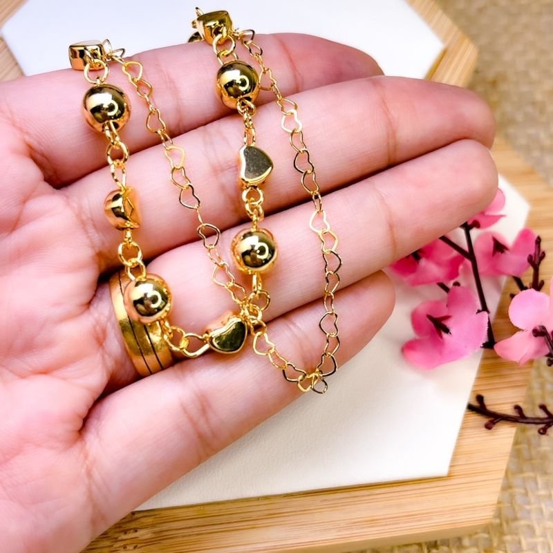PULSEIRA FOLHEADA A OURO 18K - DOIS FIOS CORAÇÃO