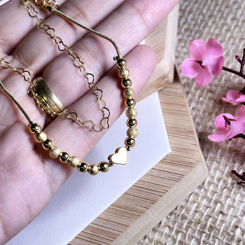 PULSEIRA FOLHEADA A OURO 18K - DOIS FIOS CORAÇÃO