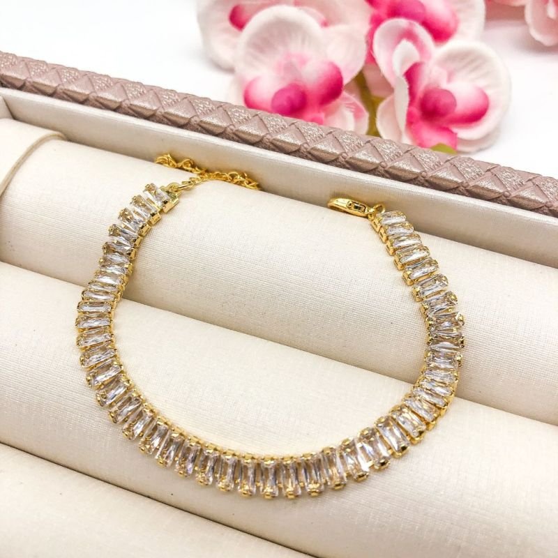 PULSEIRA FOLHEADA A OURO 18K - NAVETE BAGUETE CRISTAL