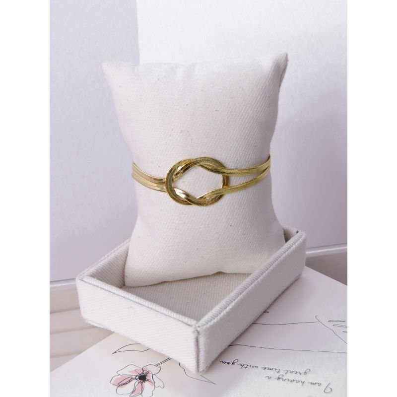 PULSEIRA FOLHEADA A OURO 18K - NÓ EM FITA